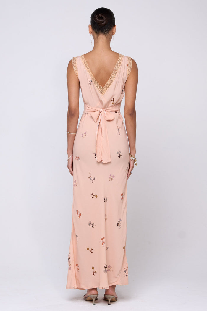 This is an image of Aimee Dress in Fleur - RESA featuring a model wearing the dress