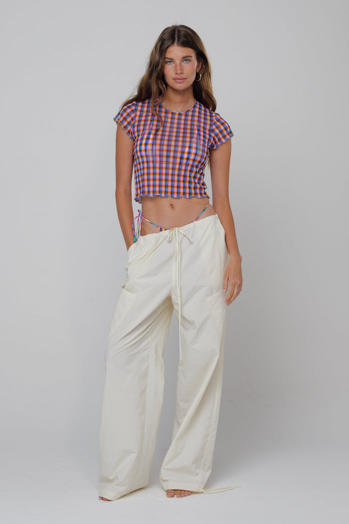 This is an image of Air Pant in Milk - RESA featuring a model wearing the dress