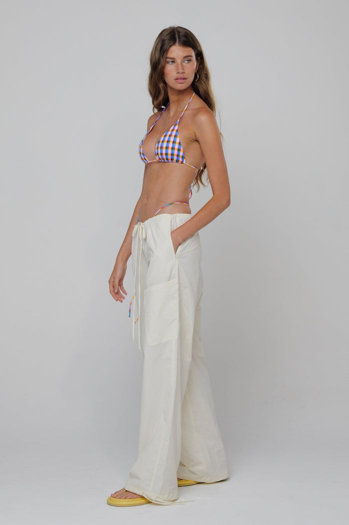 This is an image of Air Pant in Milk - RESA featuring a model wearing the dress