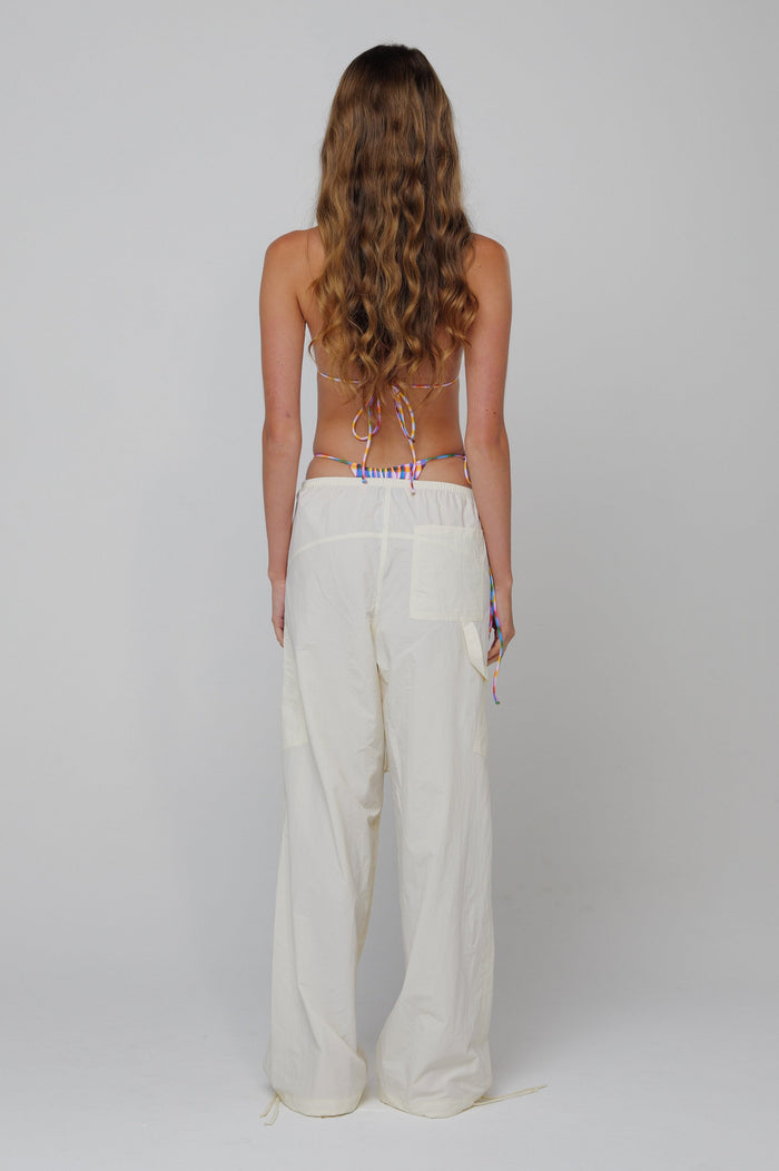 This is an image of Air Pant in Milk - RESA featuring a model wearing the dress