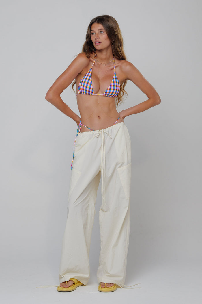 This is an image of Air Pant in Milk - RESA featuring a model wearing the dress
