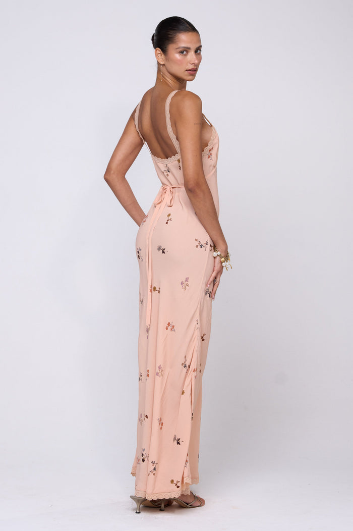 This is an image of Anais Dress in Fleur - RESA featuring a model wearing the dress