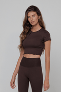 This is an image of Baby Tee Second Skin in Cacao - RESA featuring a model wearing the dress