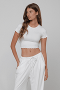 This is an image of Baby Tee Second Skin in White - RESA featuring a model wearing the dress