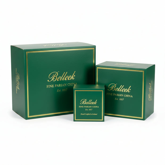 Three green boxes with 'Belleek' branding on a white background
