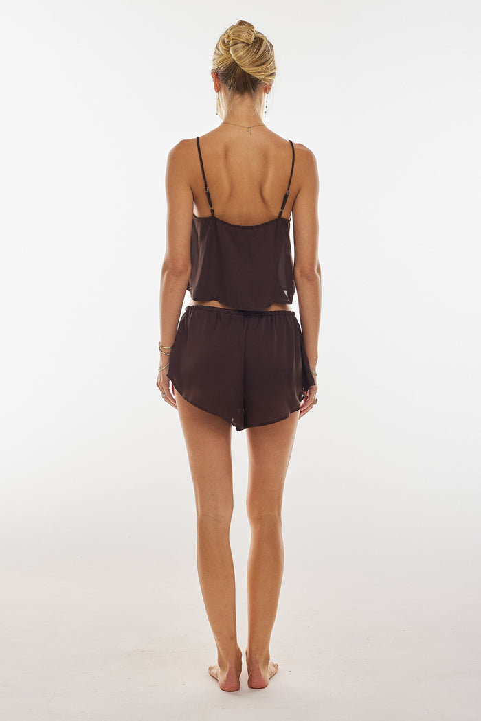 This is an image of Benny Short in Chocolate - RESA featuring a model wearing the dress