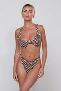 This is an image of Betsy Bikini Bottom in Tulum - RESA featuring a model wearing the dress