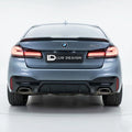 BMW 5 series G30 with Lur Design rear bumper Diffuser valance on a white background