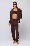 This is an image of Emily Top in Chocolate - RESA featuring a model wearing the dress
