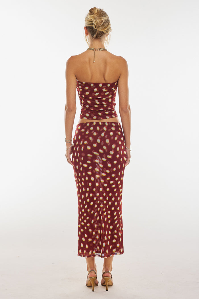 This is an image of Bonnie Mesh Top in Spice - RESA featuring a model wearing the dress