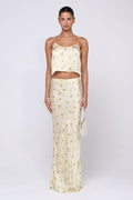 This is an image of Claire Top in Beurre - RESA featuring a model wearing the dress