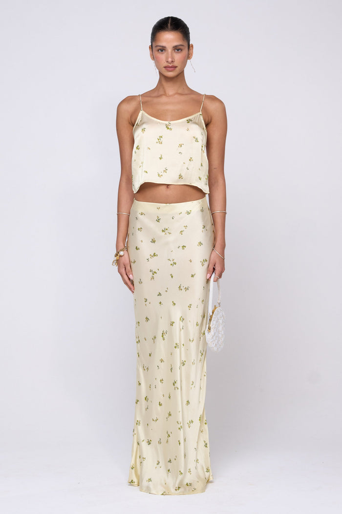 This is an image of Claire Top in Beurre - RESA featuring a model wearing the dress