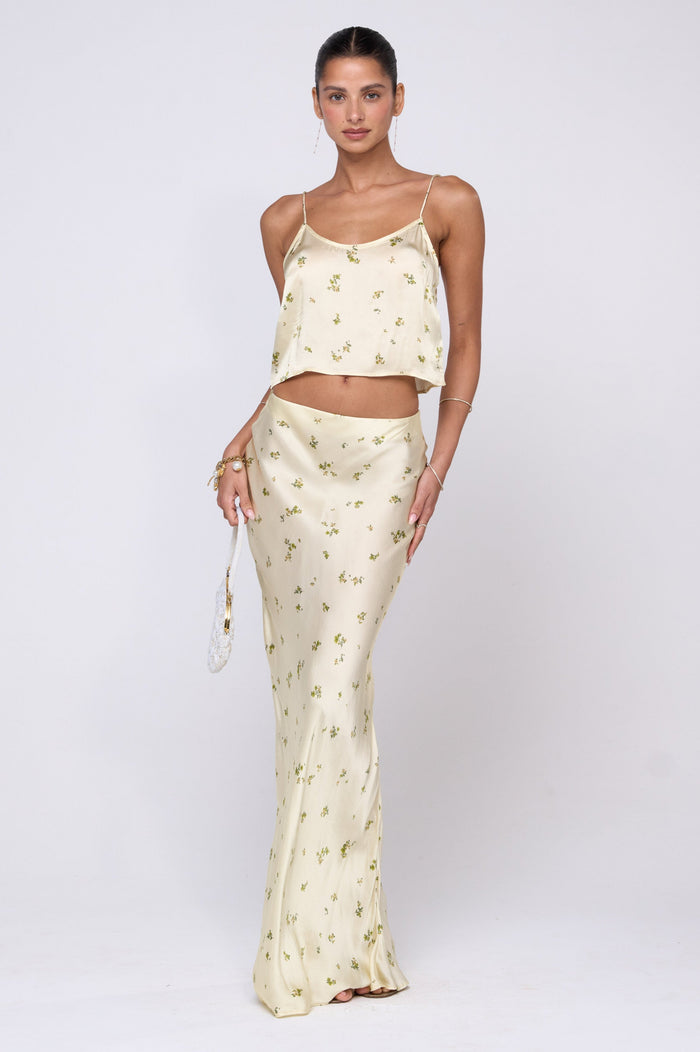 This is an image of Claire Top in Beurre - RESA featuring a model wearing the dress