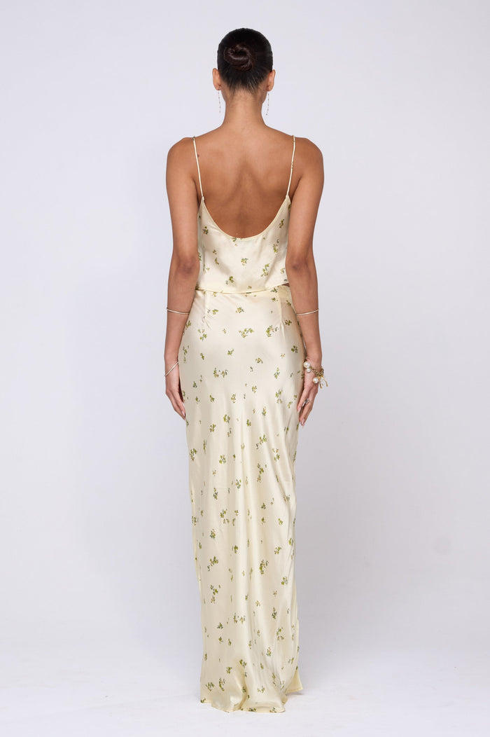 This is an image of Claire Top in Beurre - RESA featuring a model wearing the dress