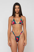 This is an image of Dillan Bikini Bottom in Resort - RESA featuring a model wearing the dress