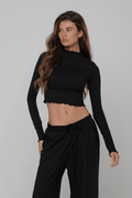 This is an image of Ida Top Second Skin in Black - RESA featuring a model wearing the dress