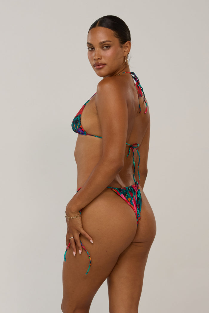 This is an image of Kyle in Resort - RESA featuring a model wearing the dress