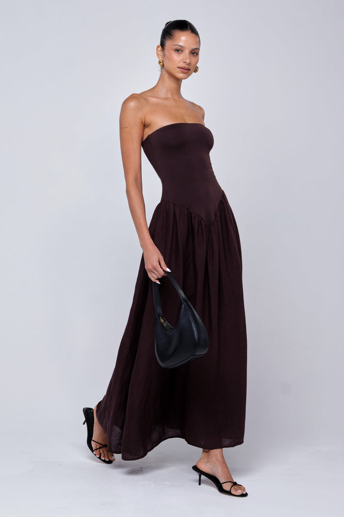 This is an image of Mackenzie Dress in Brown Linen - RESA featuring a model wearing the dress