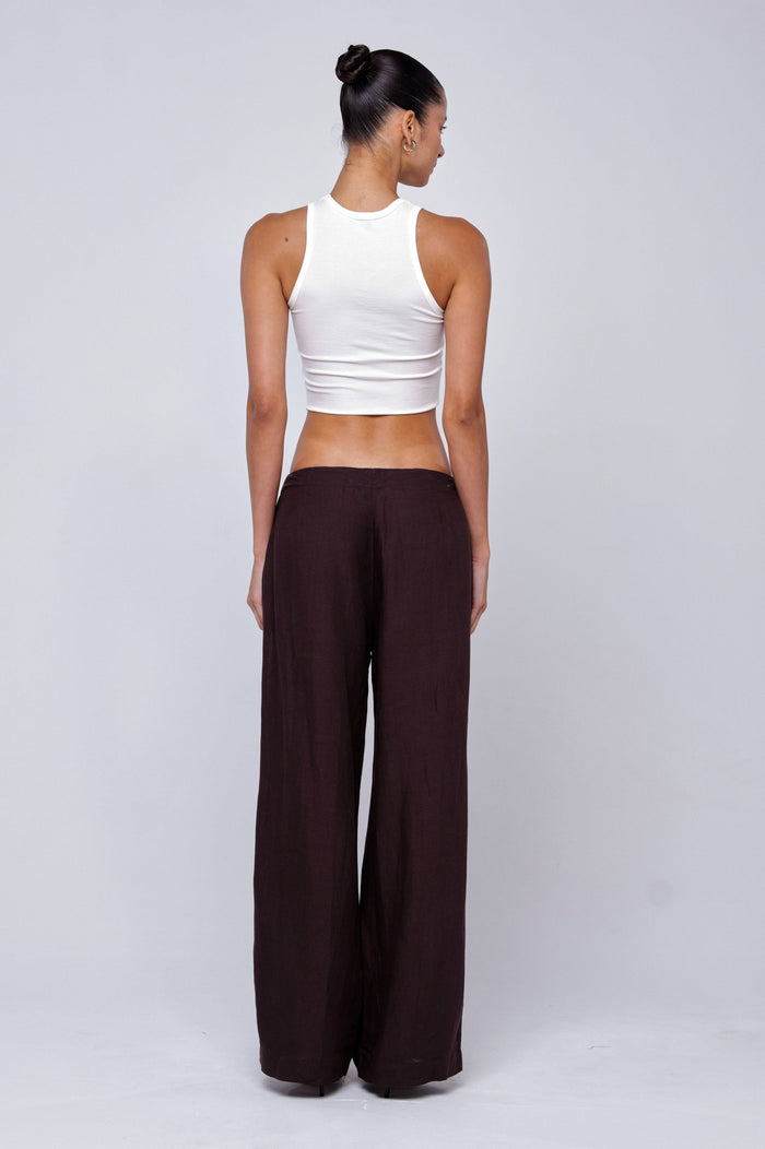 This is an image of Malcolm Trousers in Brown Linen - RESA featuring a model wearing the dress