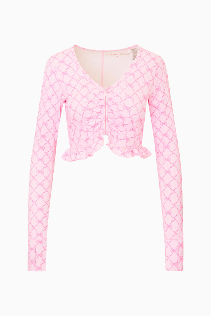 Pink bow print jacket on a white background