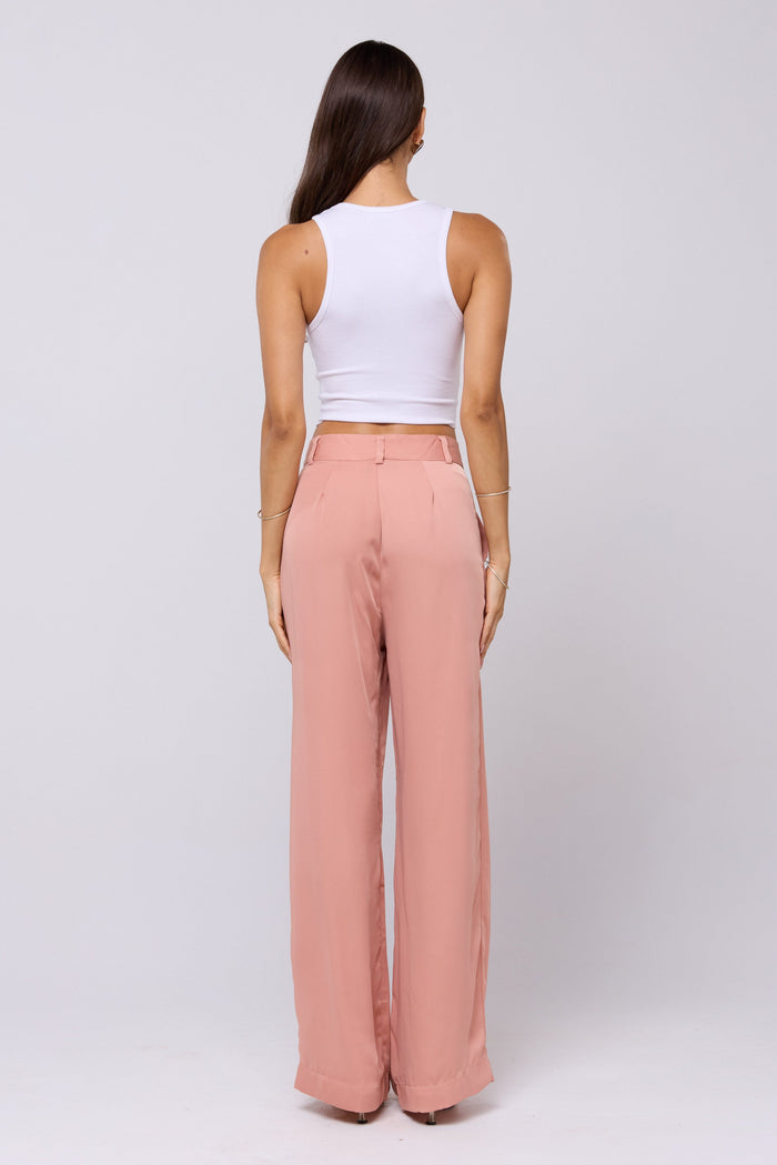 This is an image of Sasha Trouser in Blush - RESA featuring a model wearing the dress