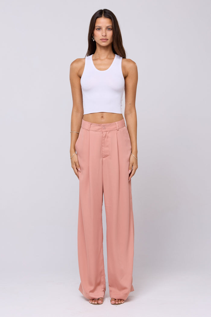 This is an image of Sasha Trouser in Blush - RESA featuring a model wearing the dress