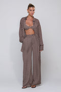 This is an image of Sasha Trouser in Tulum - RESA featuring a model wearing the dress