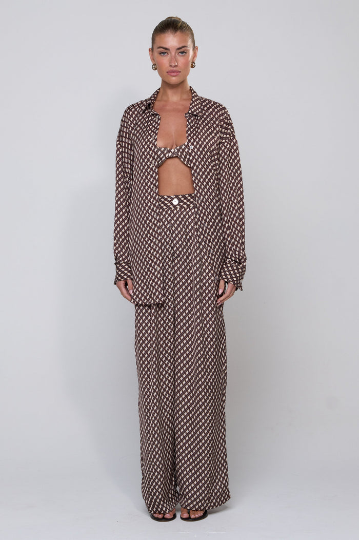 This is an image of Sasha Trouser in Tulum - RESA featuring a model wearing the dress