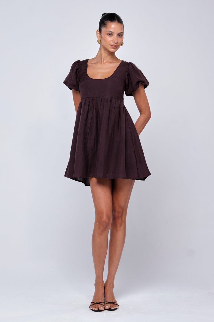 This is an image of Shay Mini in Brown Linen - RESA featuring a model wearing the dress