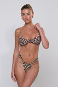 This is an image of Dillan Bikini Bottom in Tulum - RESA featuring a model wearing the dress