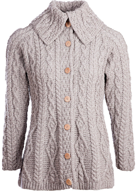 Knitted cardigan with button details on a white background