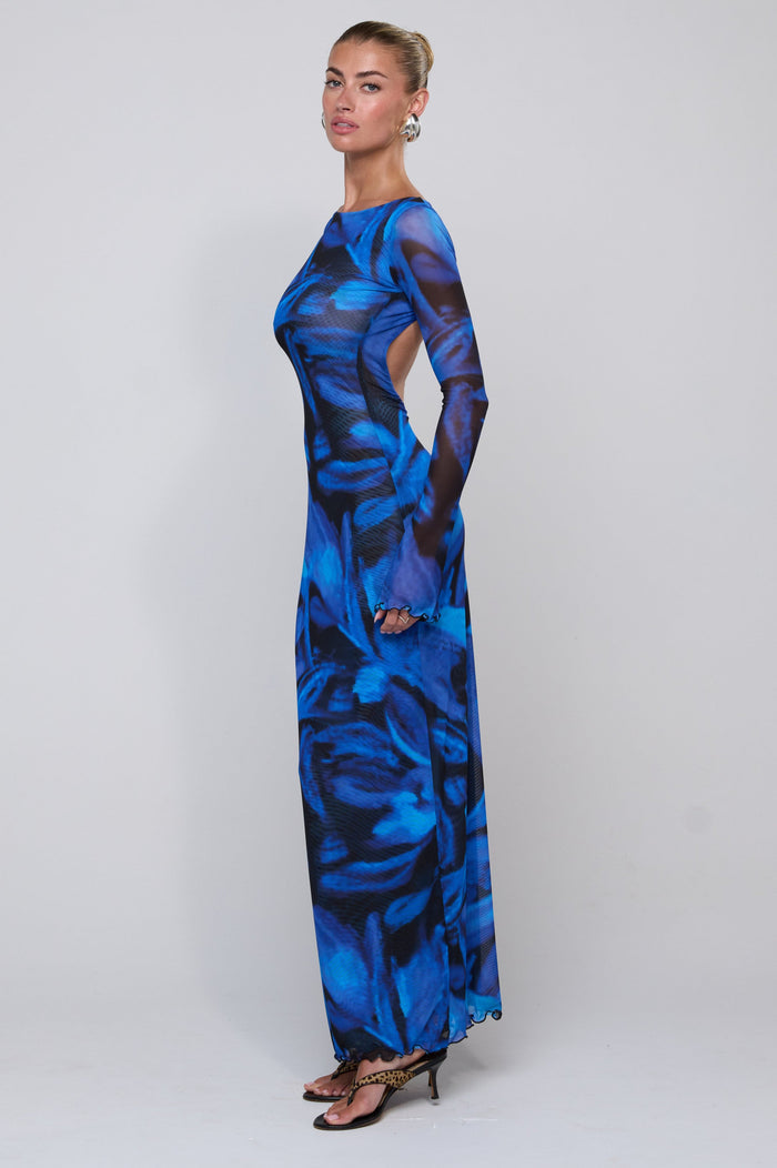 This is an image of Sylvia Dress in Lagoon - RESA featuring a model wearing the dress