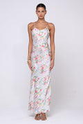 This is an image of Vida Dress in Pois - RESA featuring a model wearing the dress