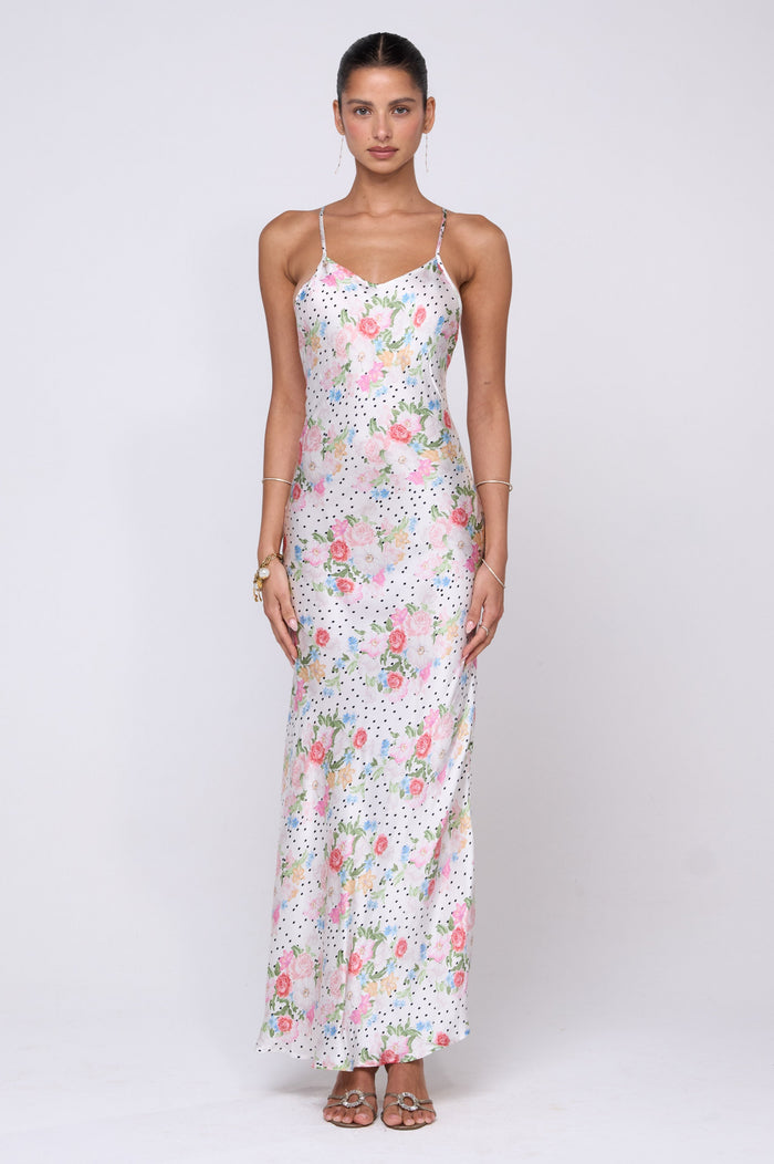 This is an image of Vida Dress in Pois - RESA featuring a model wearing the dress