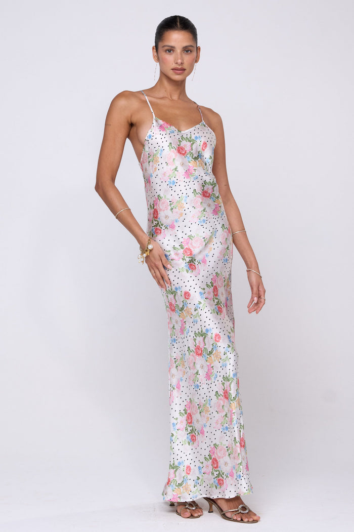 This is an image of Vida Dress in Pois - RESA featuring a model wearing the dress